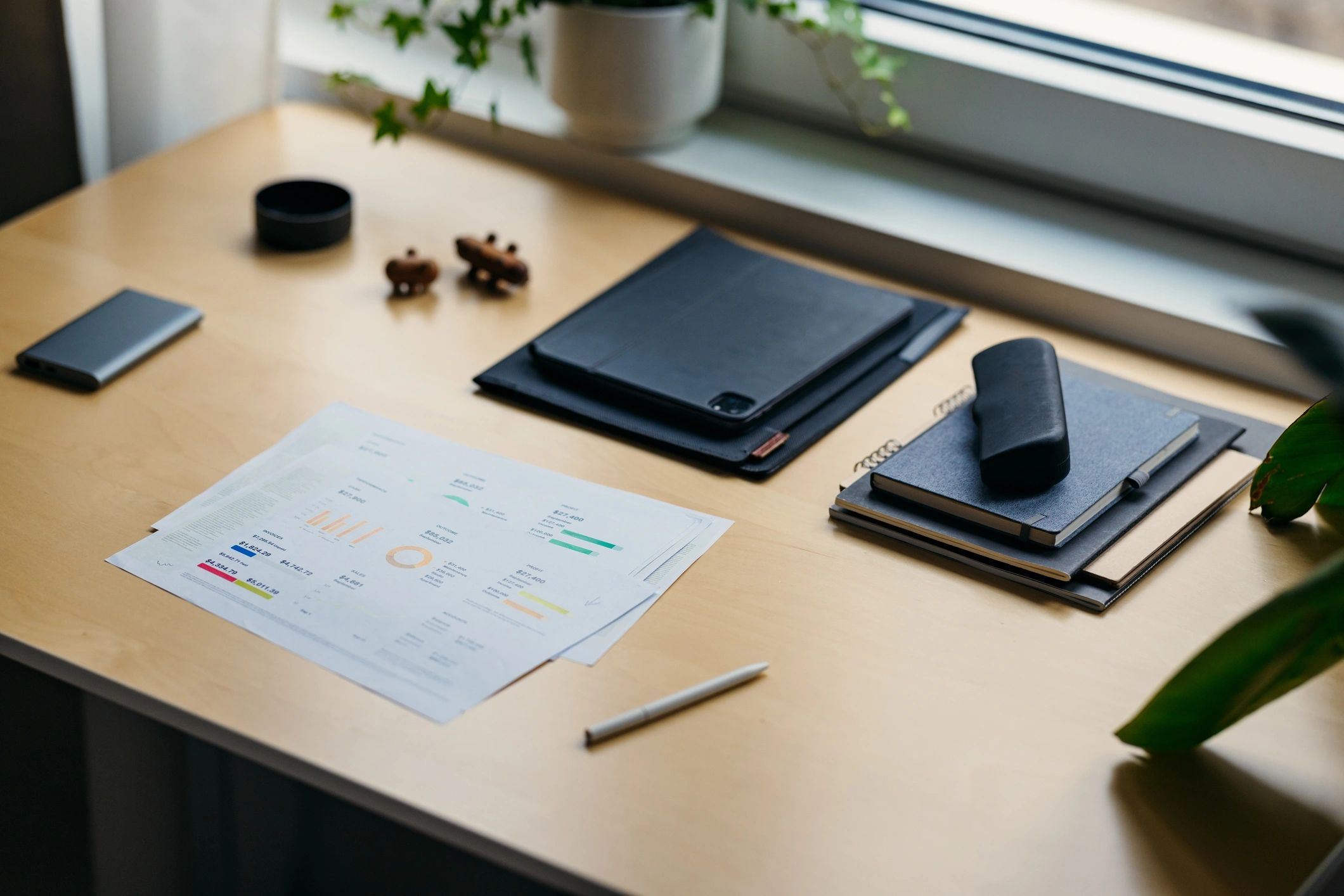 Office desk with documents and workspace items